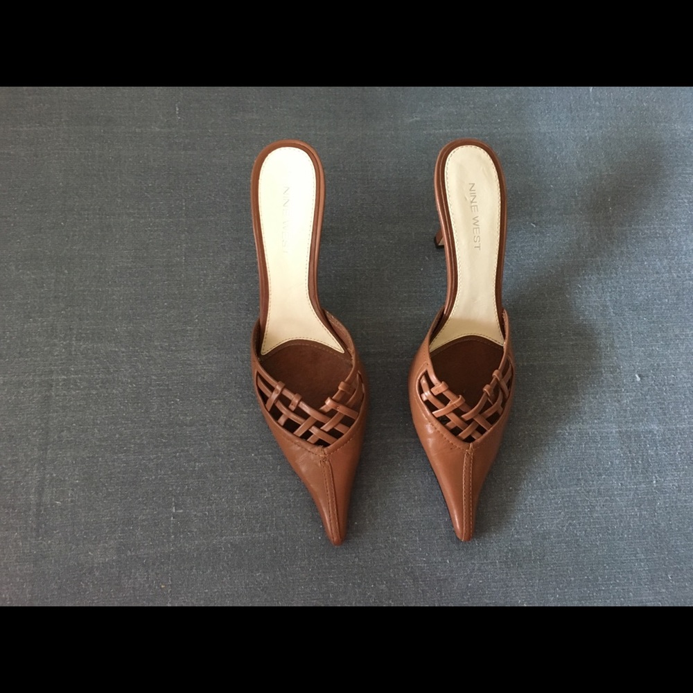Nine West brown leather mules with a kitten heel.